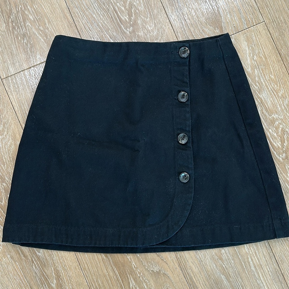 Black, jean, BDG, mini skirt. Size medium.